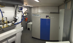View of Mobile Equine Hyperbaric Therapy (MEHOT) plant room showing compressor